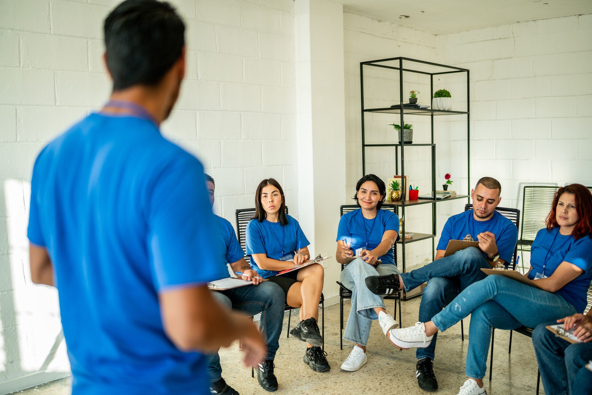 People during a presentation at community center